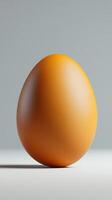 Single fresh brown egg against minimalist background photo