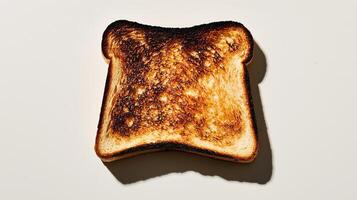 Crunchy golden brown toast with distinct charred patterns on light background photo
