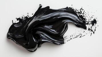Abstract black paint smear with glossy texture and dynamic flow on white background photo
