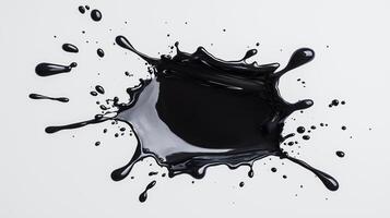 Dynamic black paint splash on white background for art and design purposes photo