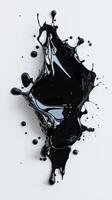 Dynamic black paint splash on white background creating abstract art photo