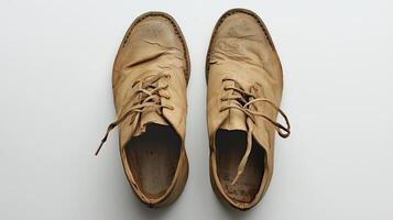 Worn leather shoes with creases and laces on white background photo
