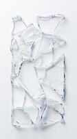 Fragmented glass pieces on white background with unique shapes and patterns photo