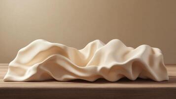 Elegant draped fabric sculpture on wooden surface highlighting textile art concept photo