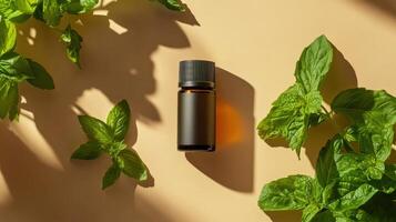 Essential oil bottle with fresh basil leaves on beige background for aromatherapy concept photo
