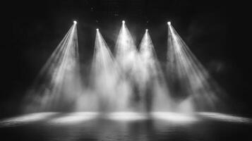 Dramatic stage lighting with five bright spotlights and atmospheric smoke photo
