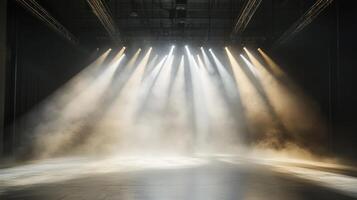 Dramatic theater stage with bright lights and atmospheric smoke photo