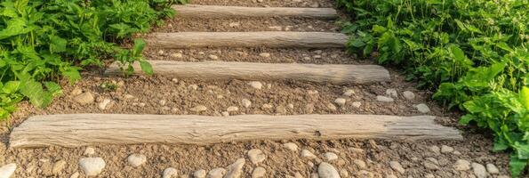 Rustic log steps in a natural garden pathway surrounded by greenery and stones photo