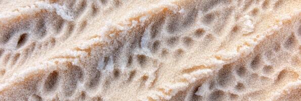 Aerial view of sandy desert dunes with textured patterns in sunlight photo