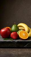 Fresh Fruit Still Life Displaying Apple, Strawberry, Orange, and Bananas photo