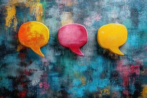 Three colorful speech bubbles on a grungy background photo