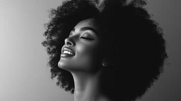Beautiful Black Woman with Curly Hair, Serene Black and White Portrait Style photo