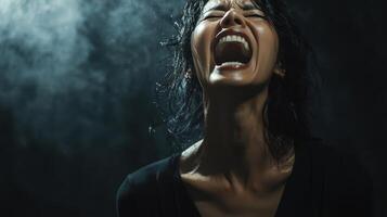 Screaming Woman Portrait, Intense Emotion, Dark Background, Unfiltered, Stressful Drama photo