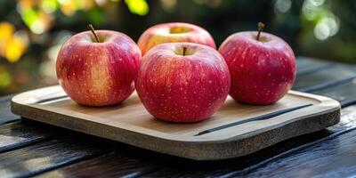 Fresh Red Apples Display on Wooden Board, Healthy Eating, Autumn Harvest photo