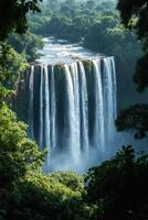 Waterfall in Jungle. Water falling down cliff in nature. Green trees around water. Beautiful natural landscape. Forest waterfall scenery. River flows over rocks. photo