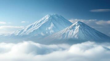 Mountain peaks with snow above the clouds. Blue sky landscape with bright light. Serene scene of nature. Winter mountain tops in peaceful environment. photo
