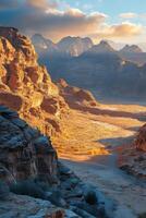 Desert canyon view. Sunlight on rocks and valley. Beautiful nature landscape. Peaceful and calm scene. Mountain range background. Clear sky above. photo