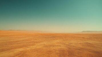 Desert landscape view. Arid land and clear sky. Horizon of dry plains with mountains. Sand texture and background. Natural earth tone and color. photo
