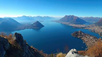 Lake View From Mountain Top. Water and Islands with Mountains in the Distance under a Blue Sky. Nature Landscape Scene. photo