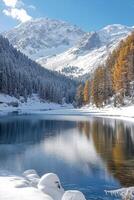 Winter lake scene. Snow covered mountains in background. Forest of trees surrounds blue water. White snow on ground with icicles hanging. photo