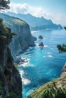 Rocky cliffs meet blue ocean water. Coastal mountain range and green trees under white clouds. Seascape nature view with wave action. photo