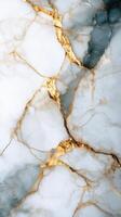 White marble surface with golden veins and grey tones. Abstract texture background. Stone material detail with cracks and shiny accents. Luxury decorative pattern. photo