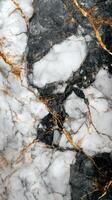 White marble with dark veins and golden highlights. Detailed texture of a rock slab. Beautiful stone material pattern. Polished surface backdrop. photo