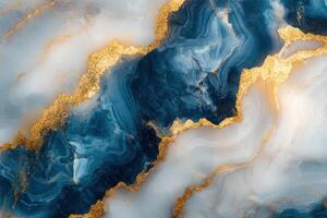 Blue and white abstract background. Golden glitter flows across the surface. Resembles marble or stone texture. Elegant design with bright gold accents. photo