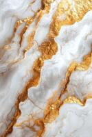 White marble texture with gold veins. Abstract background with stone pattern. Luxury wallpaper with golden streaks. Beautiful design for print. photo