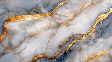 Abstract background of light gray stone with golden veins. Marble texture with gold. Stone material pattern. Luxury surface for design photo