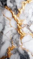 White marble surface with gray veins and rich gold details. Elegant stone texture design pattern. Luxurious background showing organic lines and shimmering light. photo