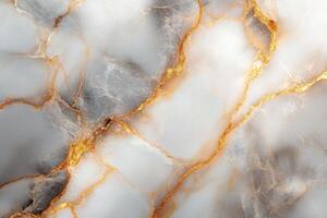 White gray stone texture with golden veins. Luxury abstract background for design. Marble pattern of natural stone surface. Elegant golden lines. photo