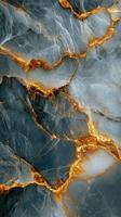 Dark gray marble texture with bright golden veins. Abstract stone pattern. Surface for banner or backdrop. Detailed natural stone design. photo