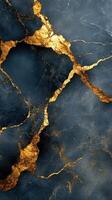 Dark blue stone texture with gold cracks. Elegant material background. Marble surface with golden veins. Natural stone pattern. Abstract wallpaper design. photo