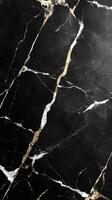 Dark stone texture. Black surface with white and golden veins. Luxury marble background. Elegant rock pattern. Stone material close up. Mineral detail photo
