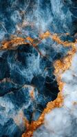 Abstract texture background. Dark blue and white stone pattern. Golden metallic veins marble surface. Luxury granite backdrop. Natural stone structure. photo