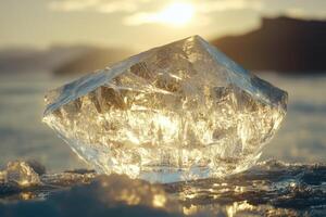 Large ice crystal sits on frozen ground. Sunlight reflects through clear structure. Landscape and bright light in background create peaceful scene. photo