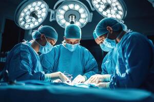 Surgical team performs an operation under bright lights. Medical professionals in scrubs work in a sterile operating room. Focus on patient below. photo
