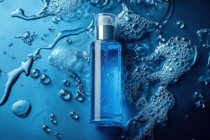 Blue liquid inside glass bottle. Beauty product with dispenser sits on surface with water droplets and bubbles. Spa treatment close up. photo