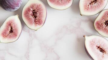 Figs on a white marble surface photo