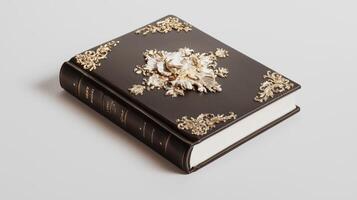 A book with gold and black decorations on it photo