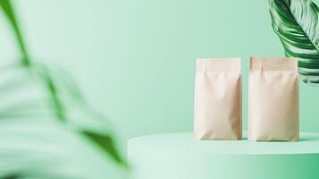 Two empty paper bags on a table with green leaves photo