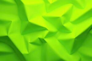 A green fabric with folds and folds photo