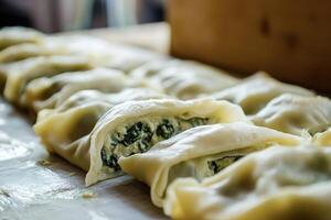 Pastry chef preparing delicious spinach and ricotta filling in phyllo dough photo