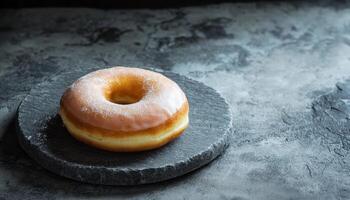 Delicious Glazed Donut on Stone Plate Kitchen Background Copyspace for Text photo