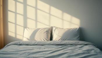 Elegant Grey Bed with Soft Sunlight and Copyspace Background Cozy Indoor Setting photo