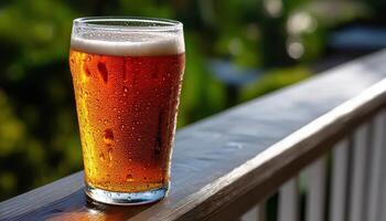 Refreshing Beer Glass on Wooden Table with Green Background and Copyspace for Events photo