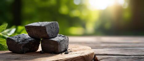 Grilling Essentials Charcoal Briquettes on Wooden Surface Nature Background Copyspace for Cooking Ideas photo