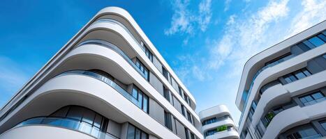 Futuristic Residential Complex with Sleek Curving Lines Urban Background Copyspace Modern Architecture photo