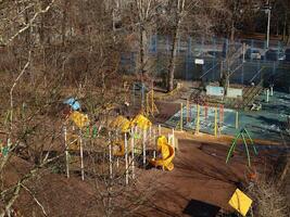 A Beautiful Aerial View of a Vibrant Colorful Playground Nestled among Lush Nature photo